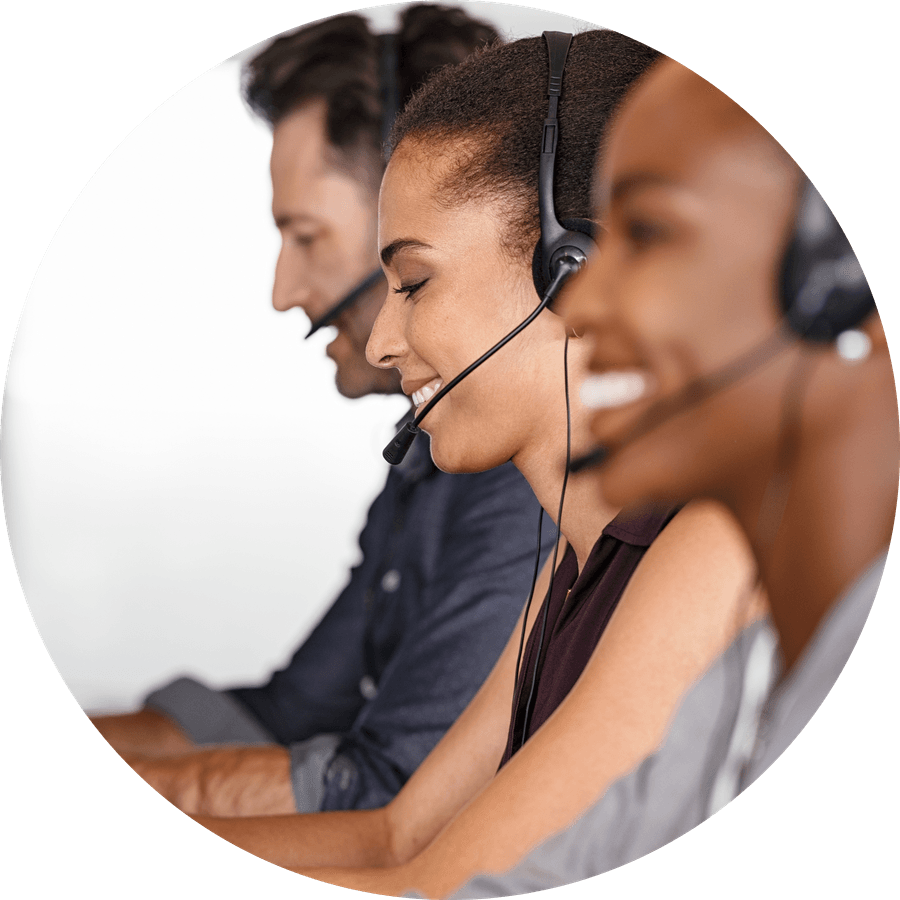 A support team on headsets at their screens