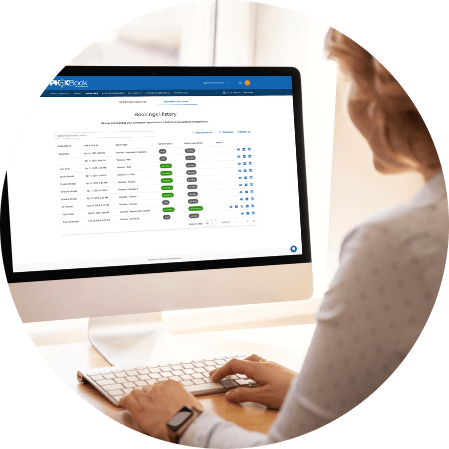 The PhoxBook bookings history open on a pharmacy desktop
