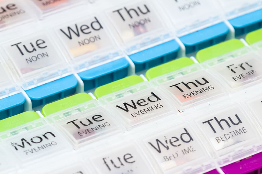 Weekly compliance packs filled and labelled by day and dose