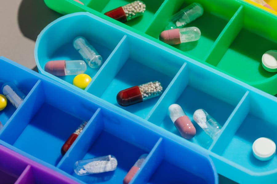 Capsules sorted into the compartments of a counting tray